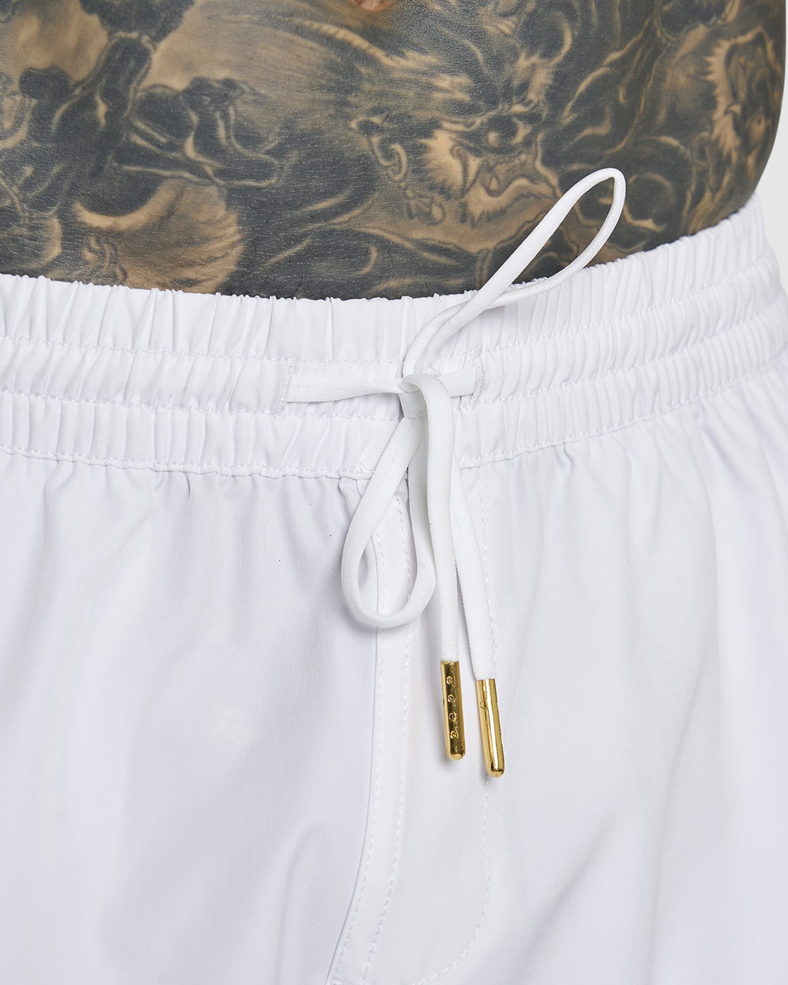 Model wearing LSKD x LM Rep 7" Performance Shorts - White