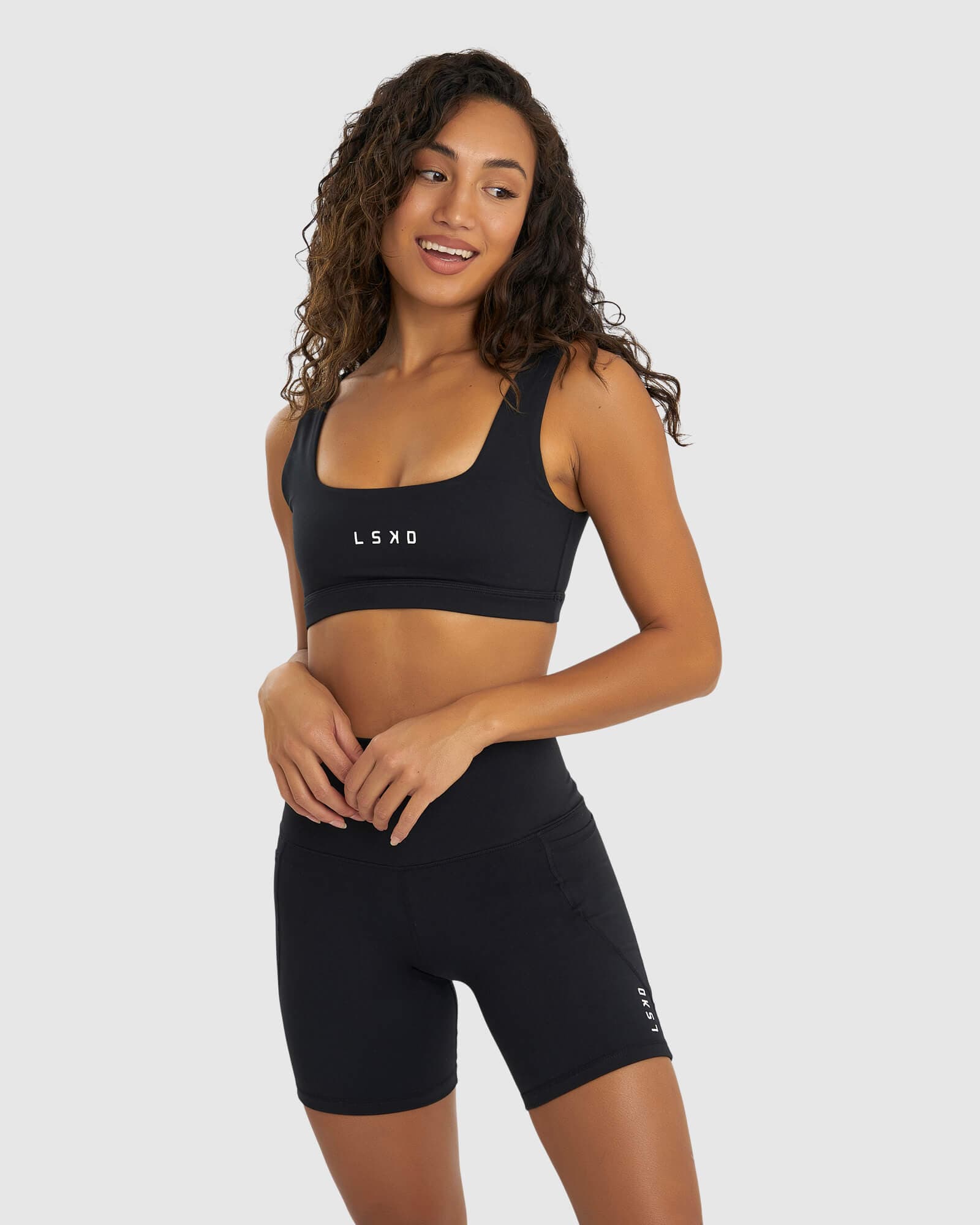 Model wearing Port Sports Bra - Black