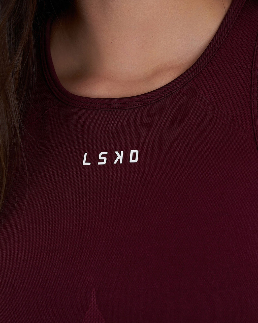 Model wearing Limitless Seamless Crop Top - Wine