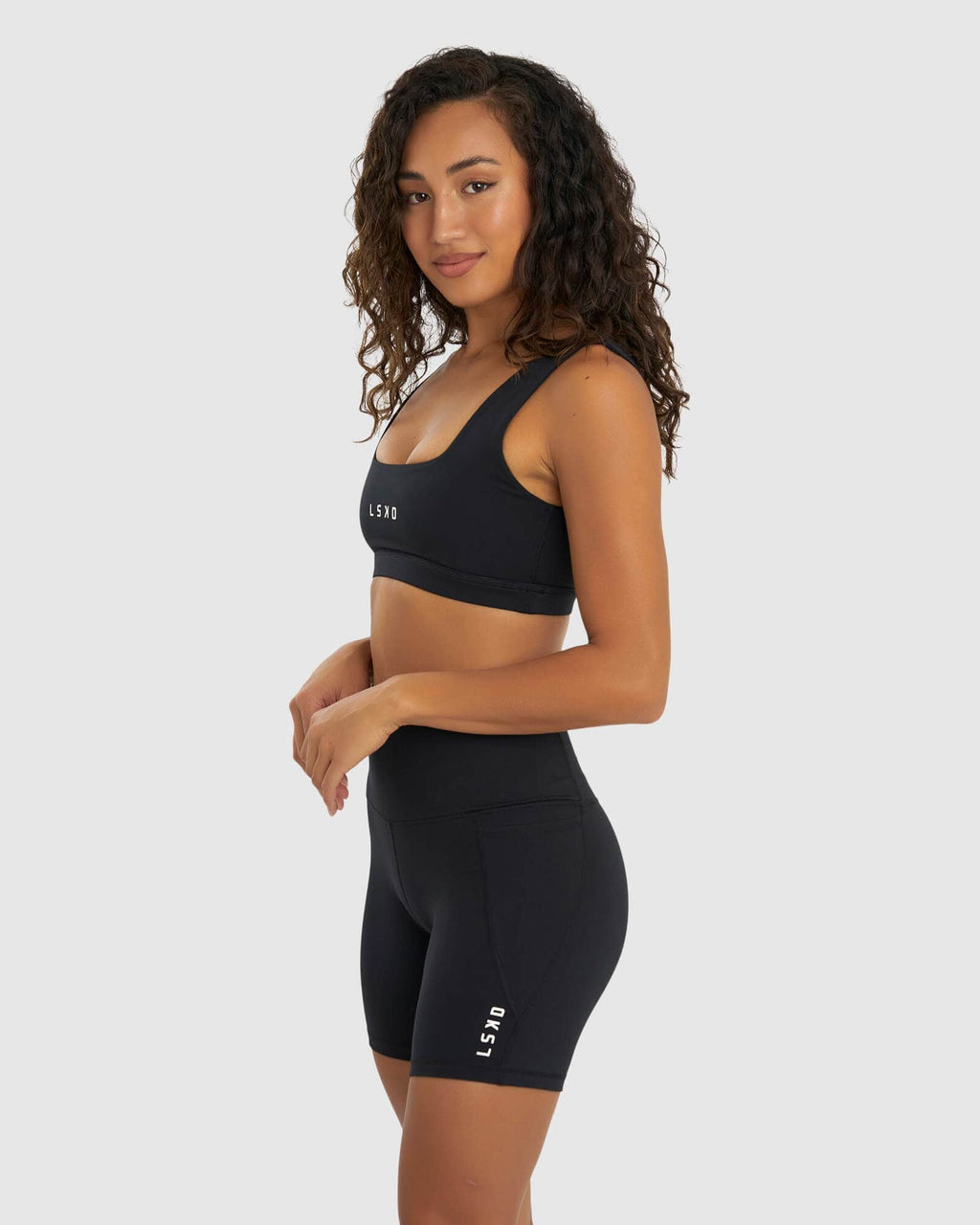 Model wearing Port Sports Bra - Black