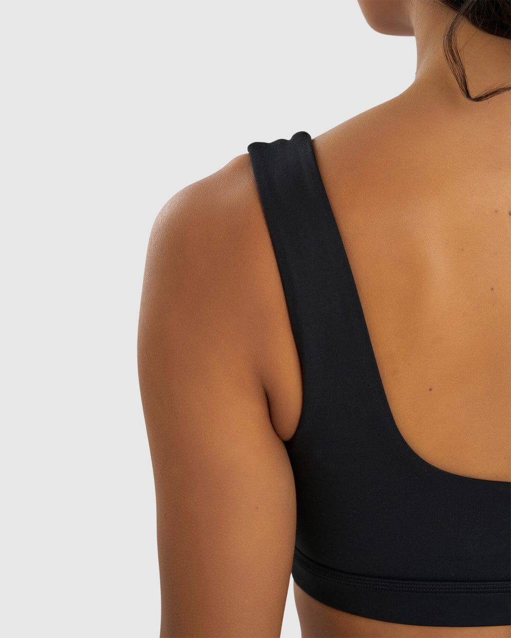 Model wearing Port Sports Bra - Black