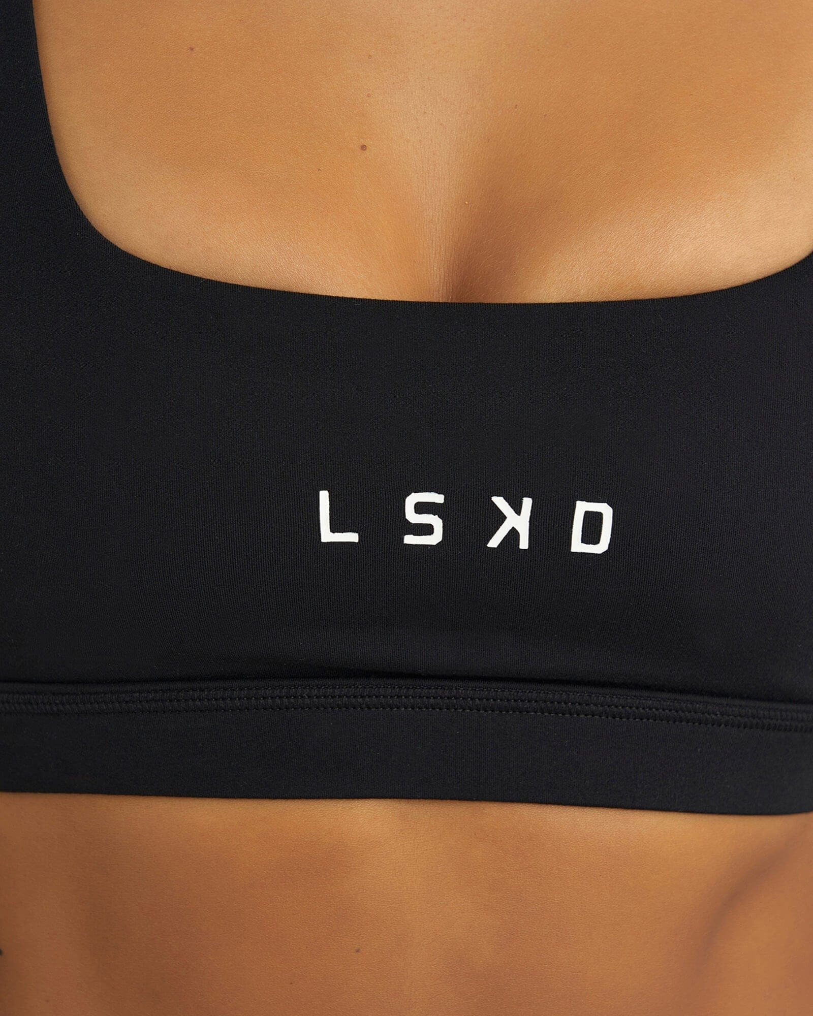 Model wearing Port Sports Bra - Black