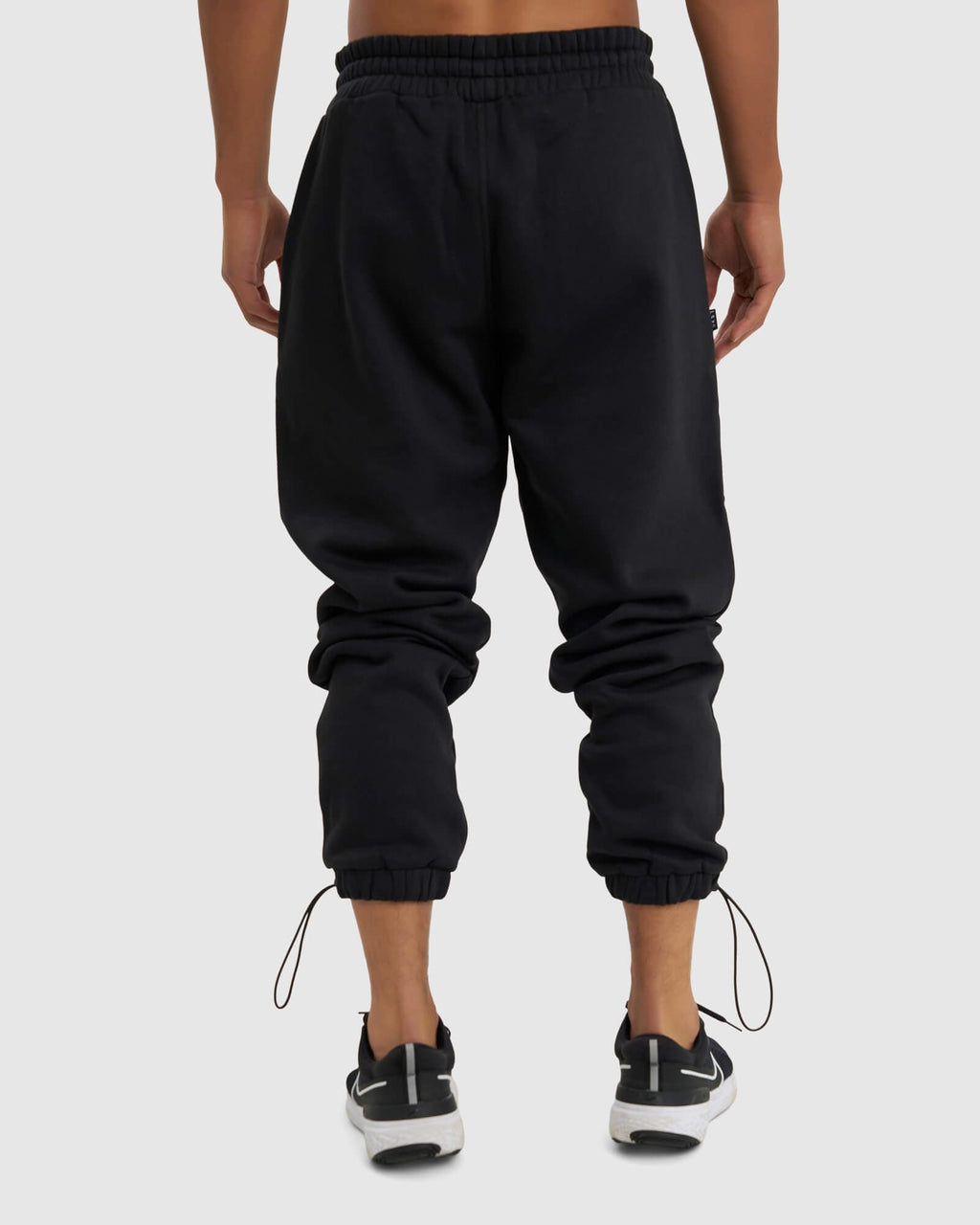 Model wearing Coach Track Pant - Black