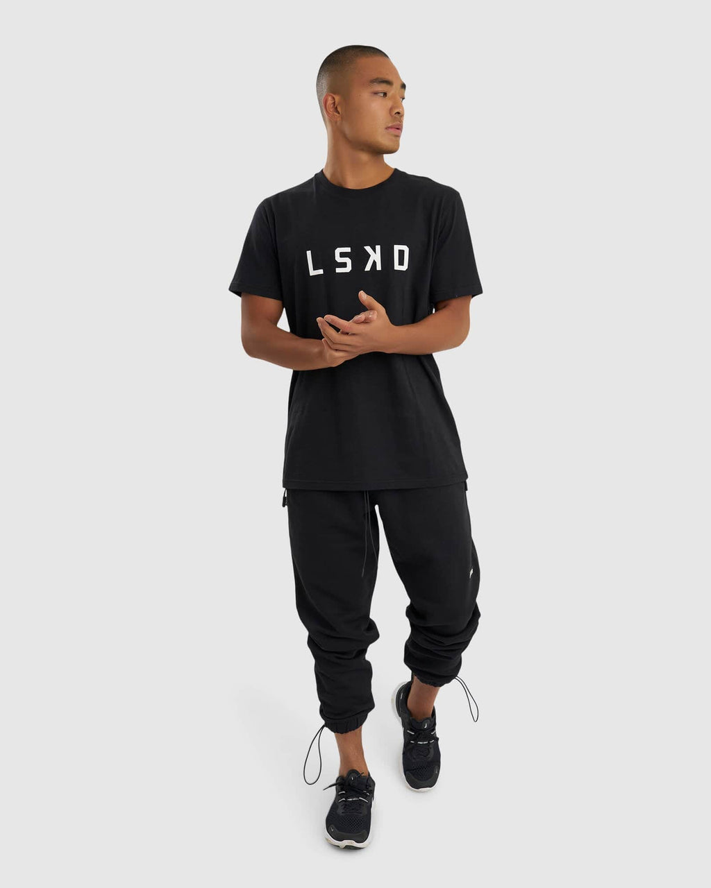 Model wearing Coach Track Pant - Black