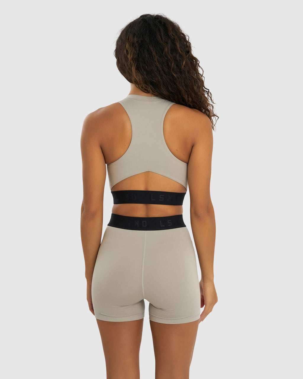 Model wearing Competition Sports Bra - Pewter