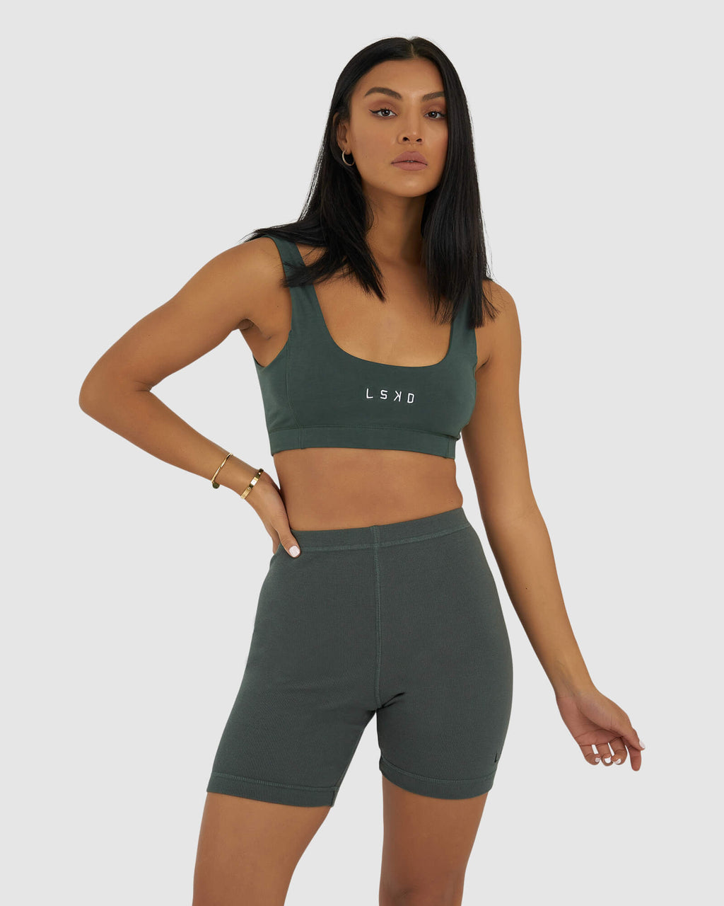 Model wearing Willow Lounge Bra - Carbon Green