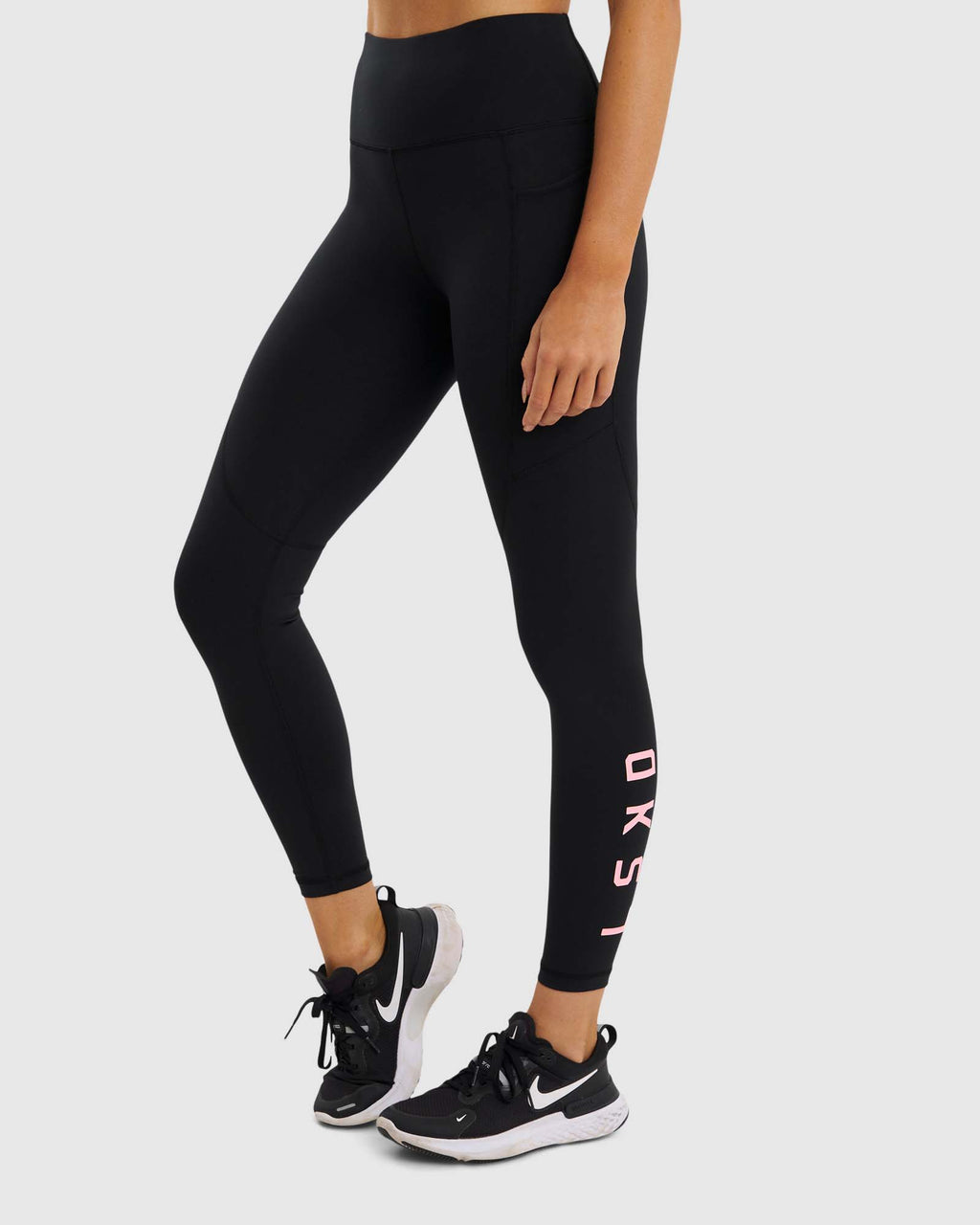 Model wearing Rep Full Length Tight - Black-Petal Pink