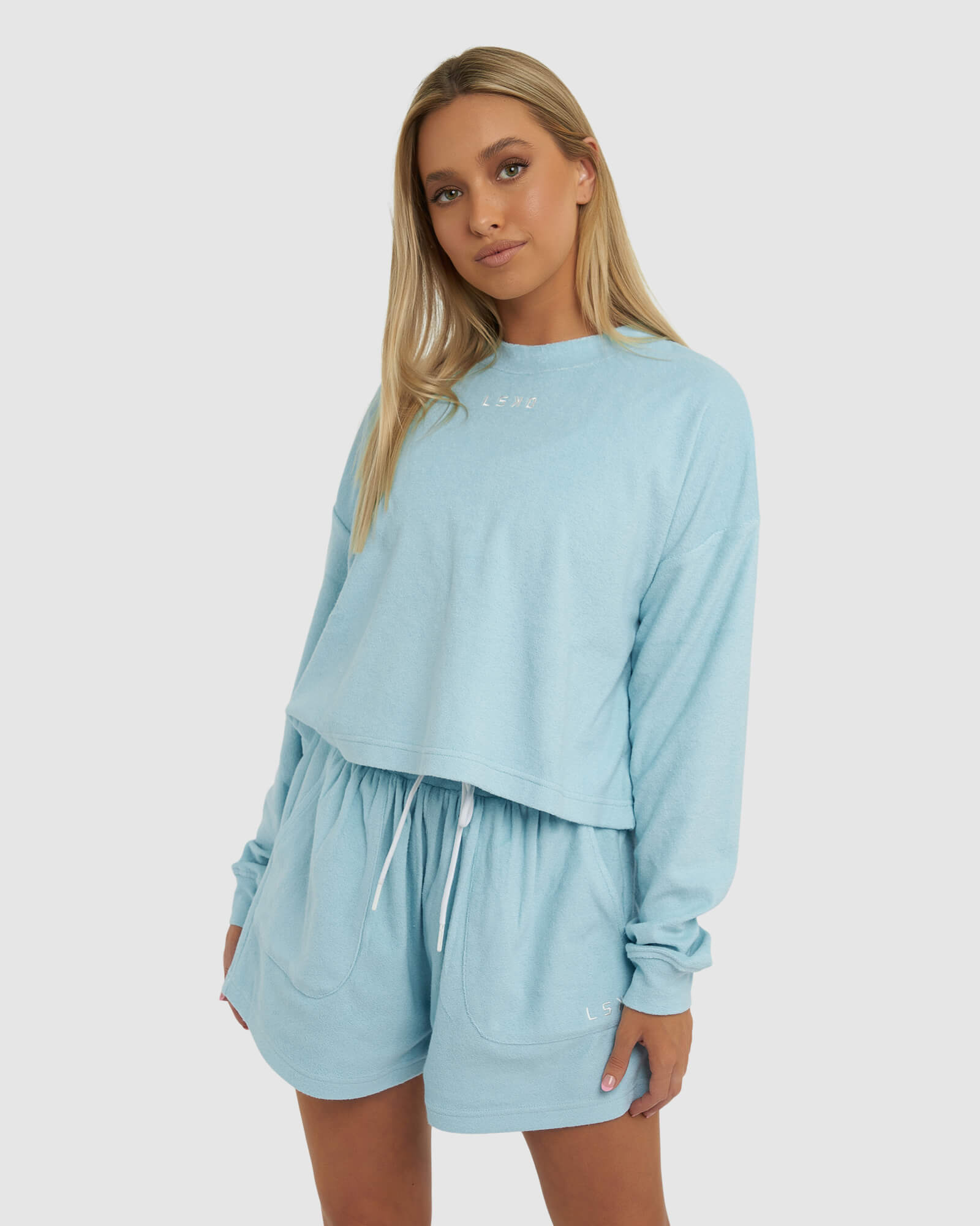 Model wearing Field LS Tee - Blue