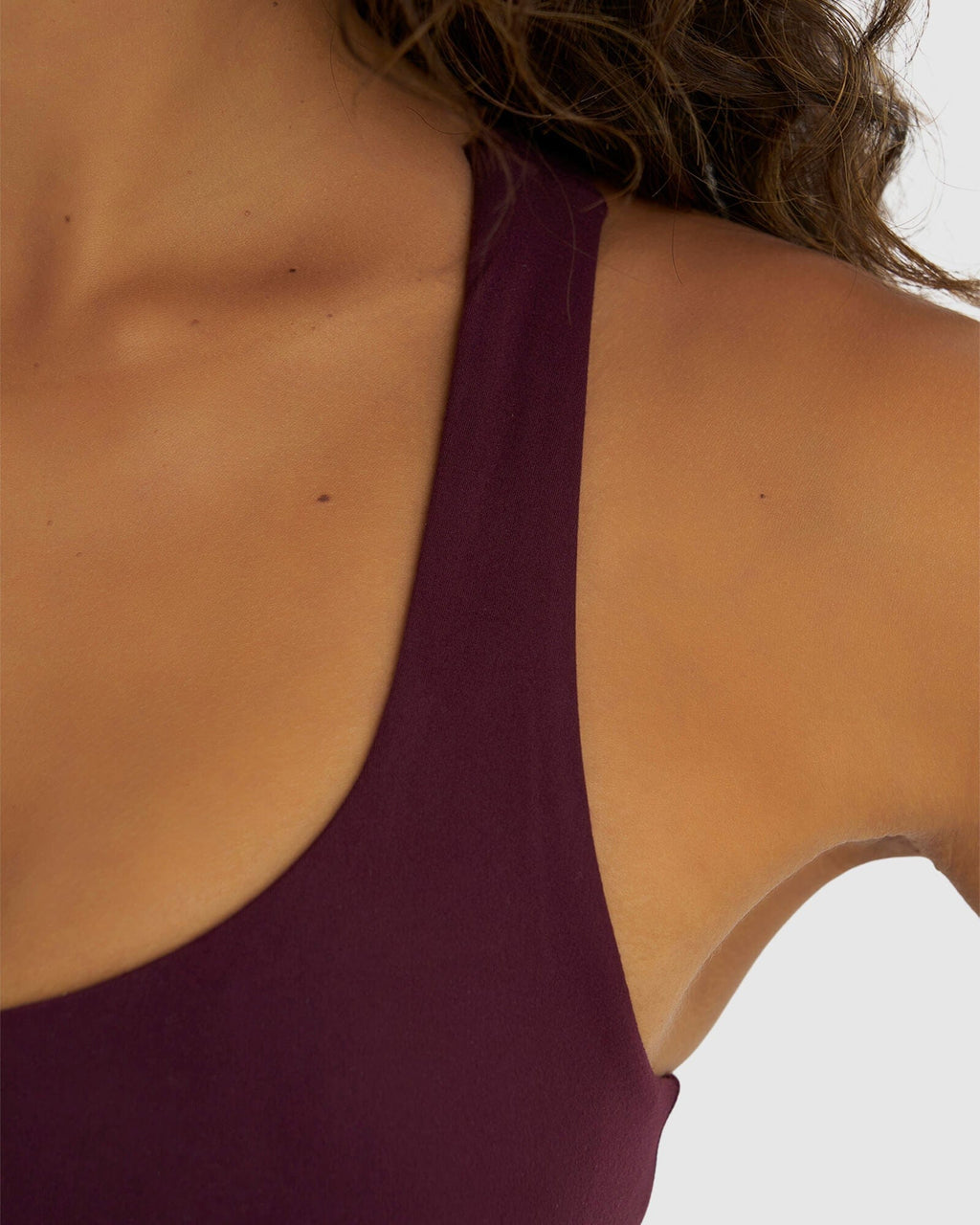 Model wearing Rep Sports Bra Small Logo - Wine