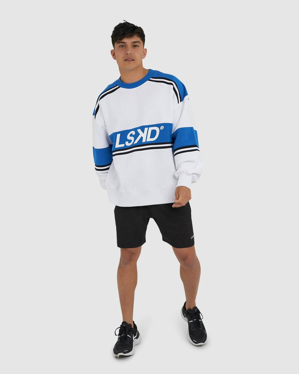 Model wearing Unisex A-Team Sweater Oversize - White