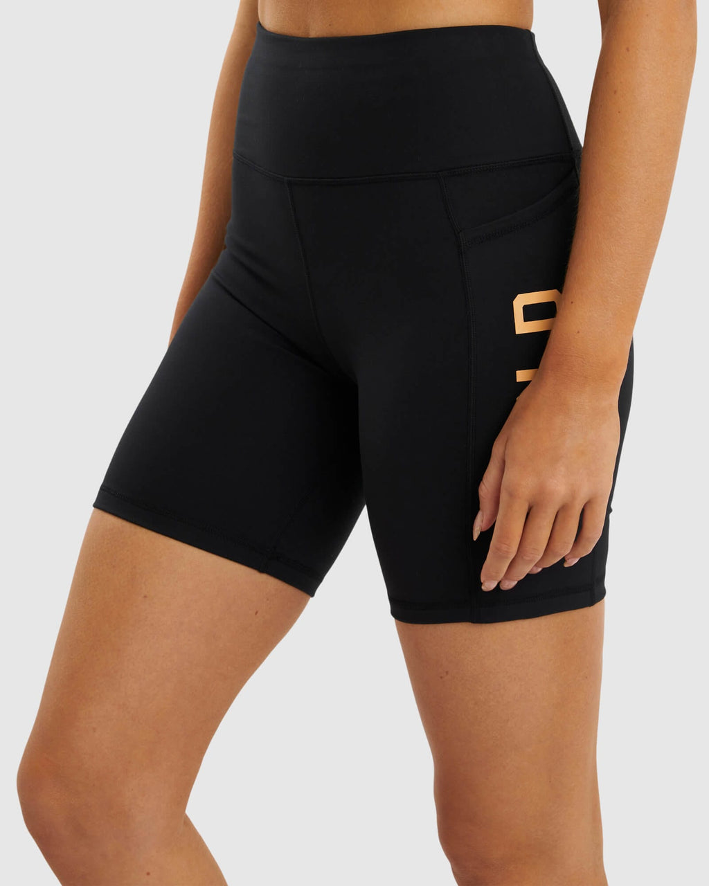 Model wearing Rep Mid Short Tight  - Black-Sherbet