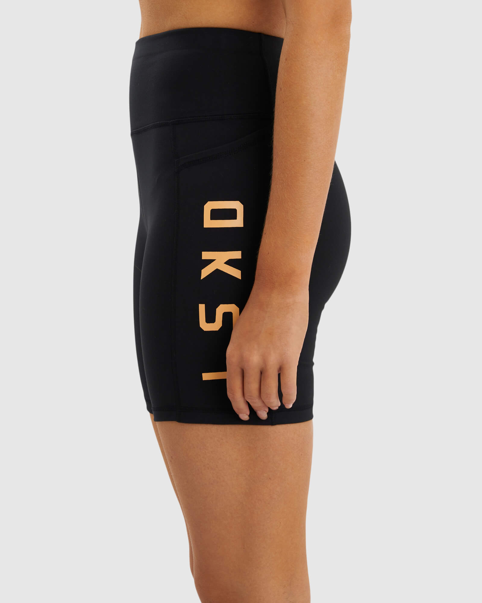 Model wearing Rep Mid Short Tight  - Black-Sherbet