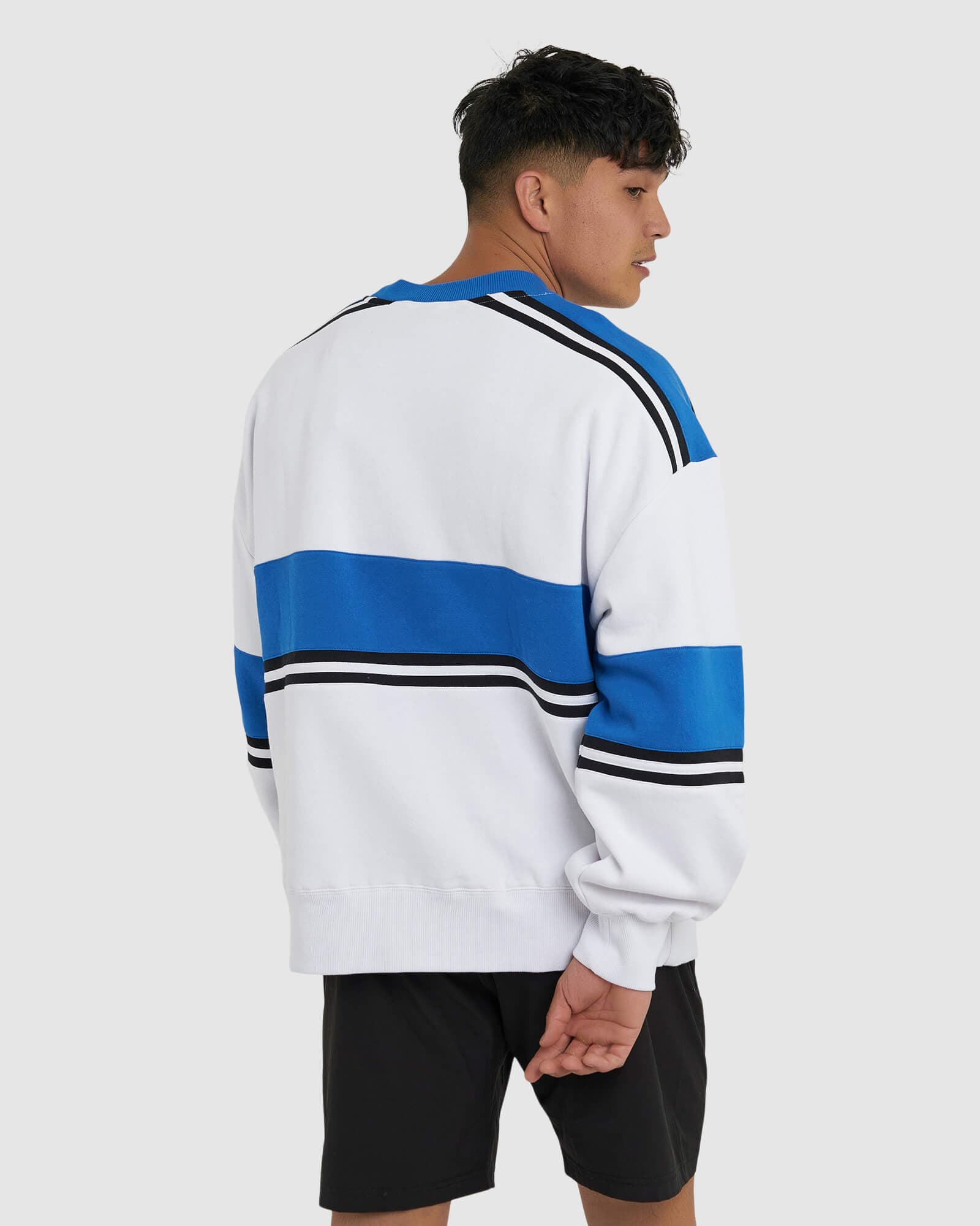 Model wearing Unisex A-Team Sweater Oversize - White