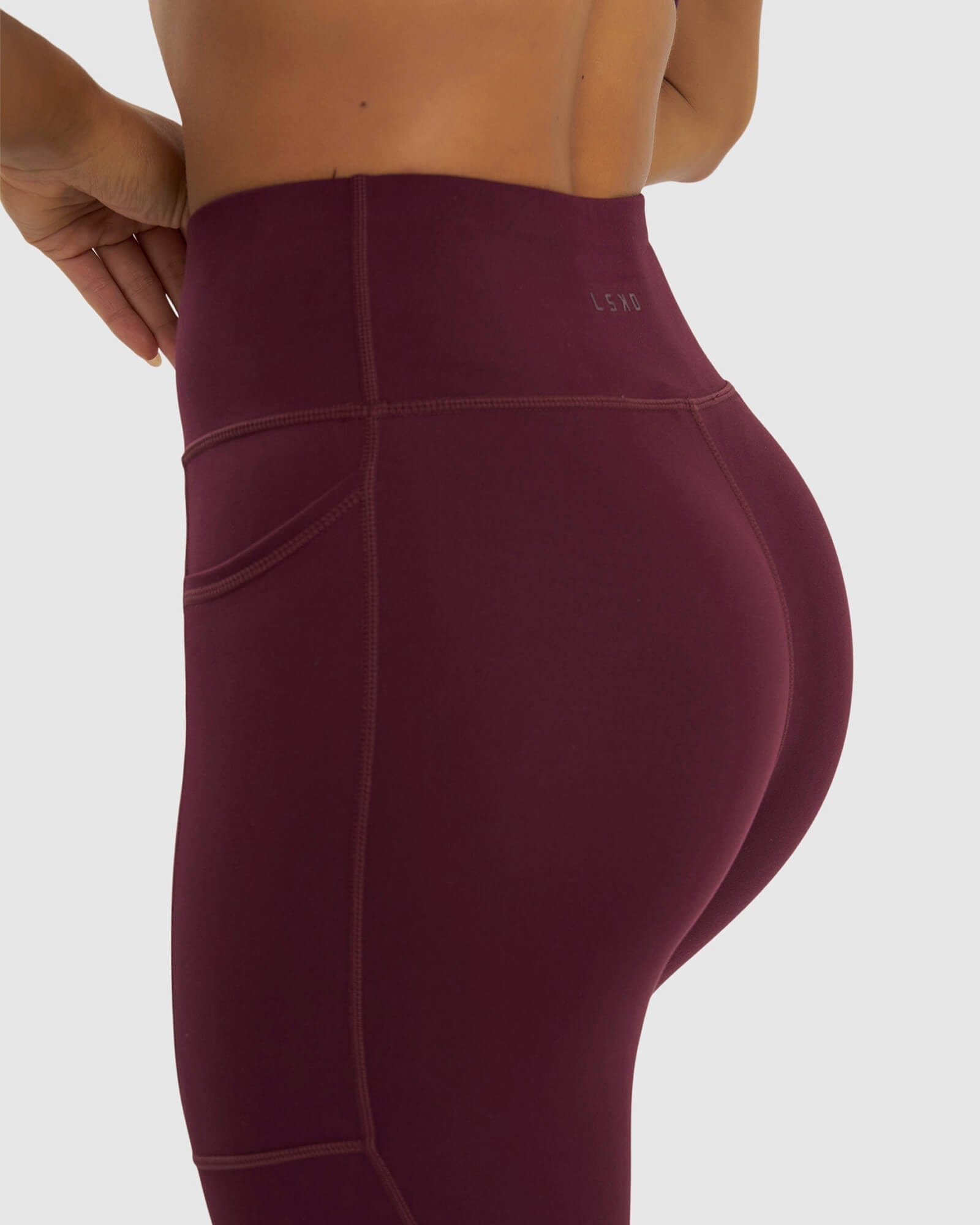 Model wearing Rep 7/8 Length Tight - Wine