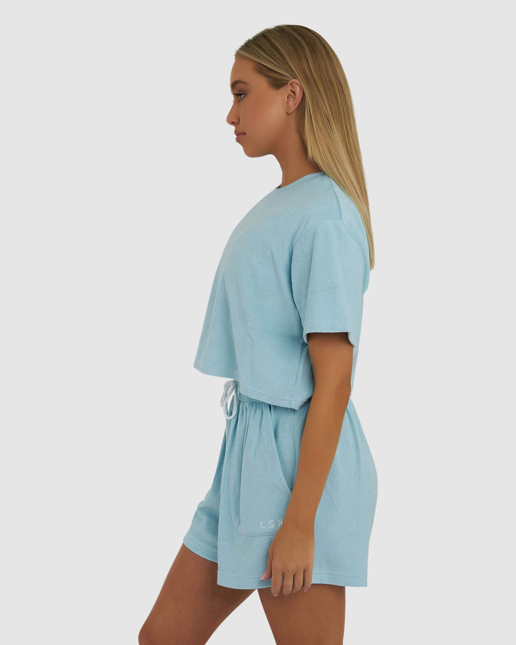 Model wearing Field Crop Tee - Blue