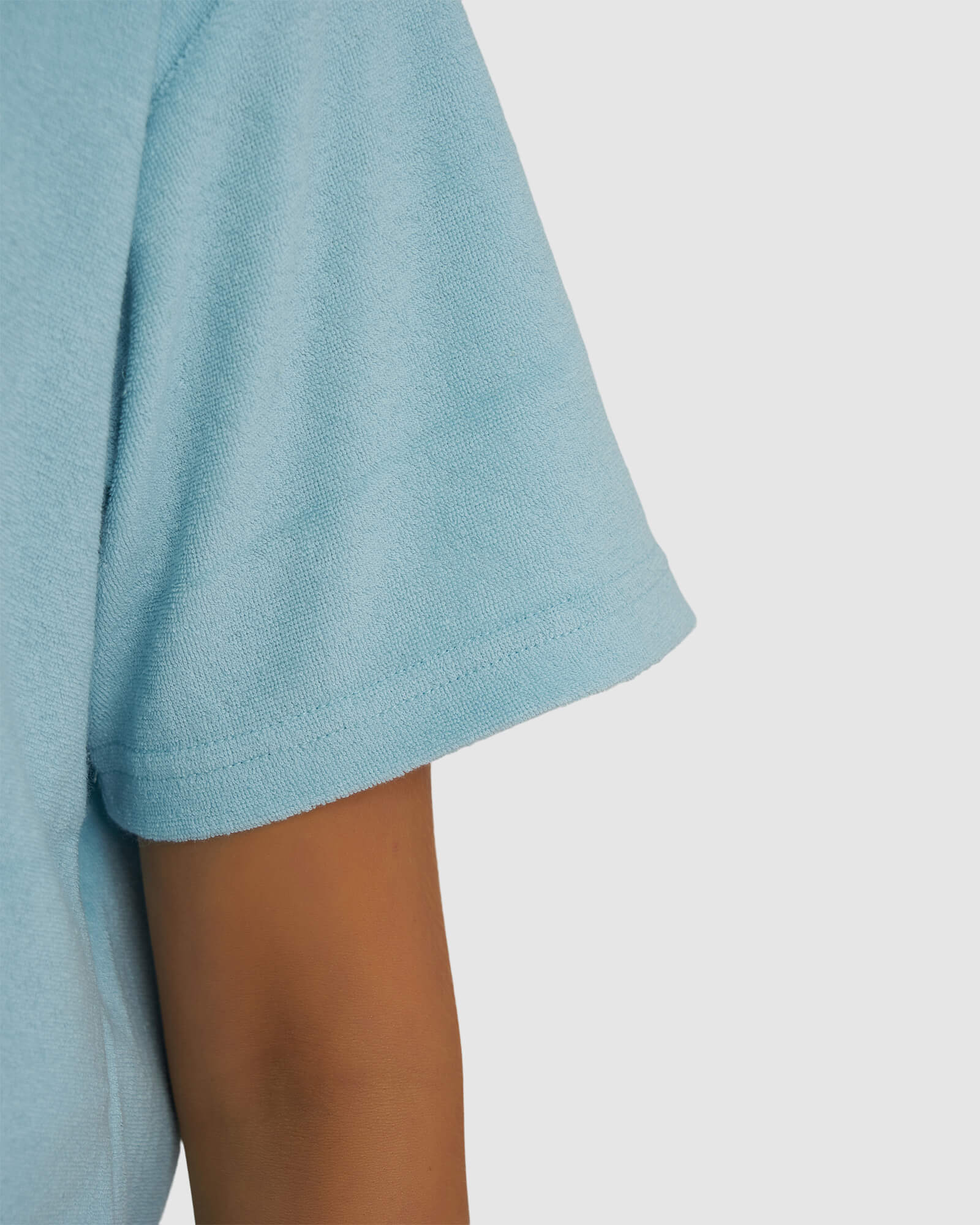 Model wearing Field Crop Tee - Blue