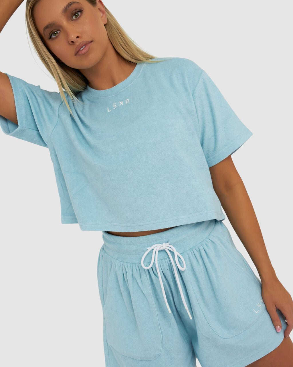 Model wearing Field Crop Tee - Blue