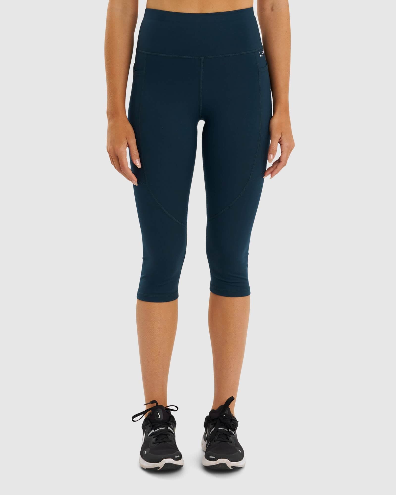 Model wearing Rep 3/4 Length Tight - Deep Teal