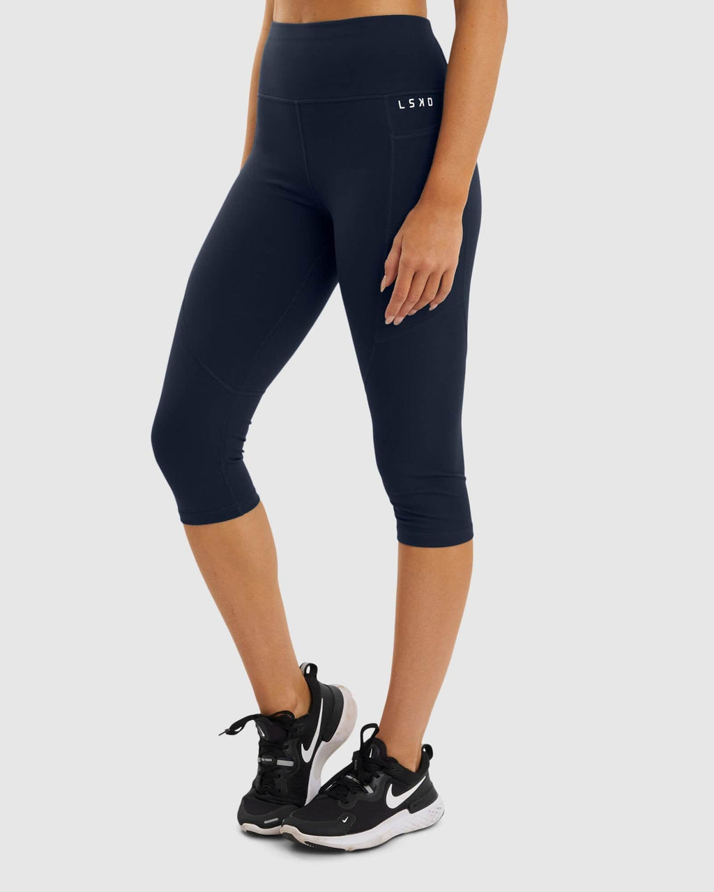 Model wearing Rep 3/4 Length Tight Small Logo - Navy