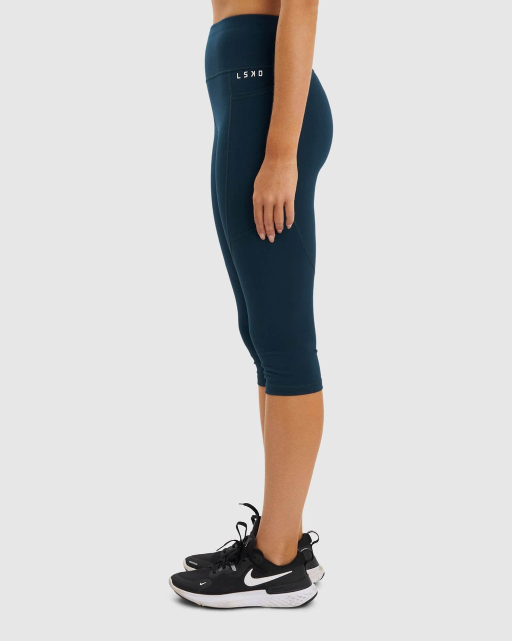 Model wearing Rep 3/4 Length Tight - Deep Teal