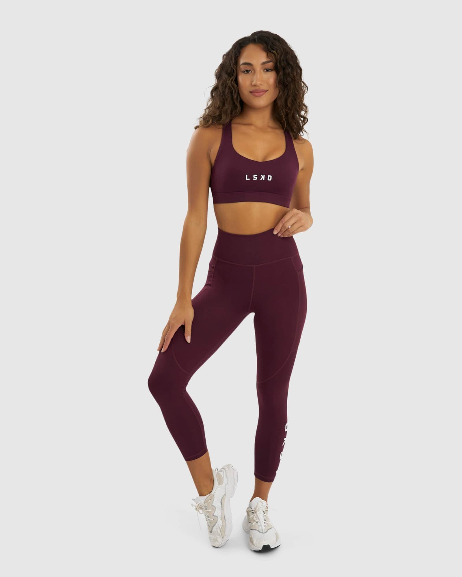Model wearing Rep 7/8 Length Tight - Wine