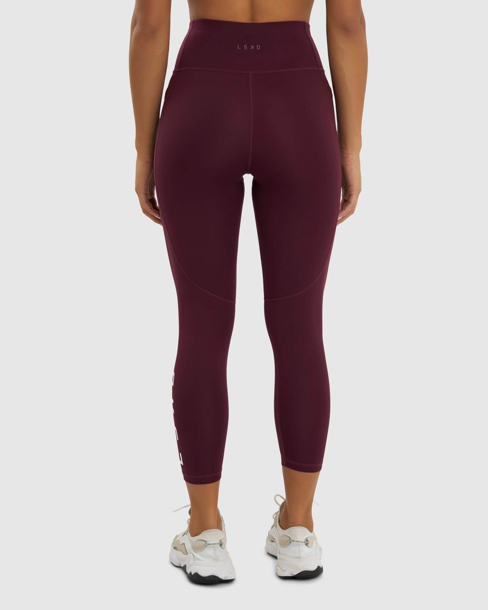 Model wearing Rep 7/8 Length Tight - Wine