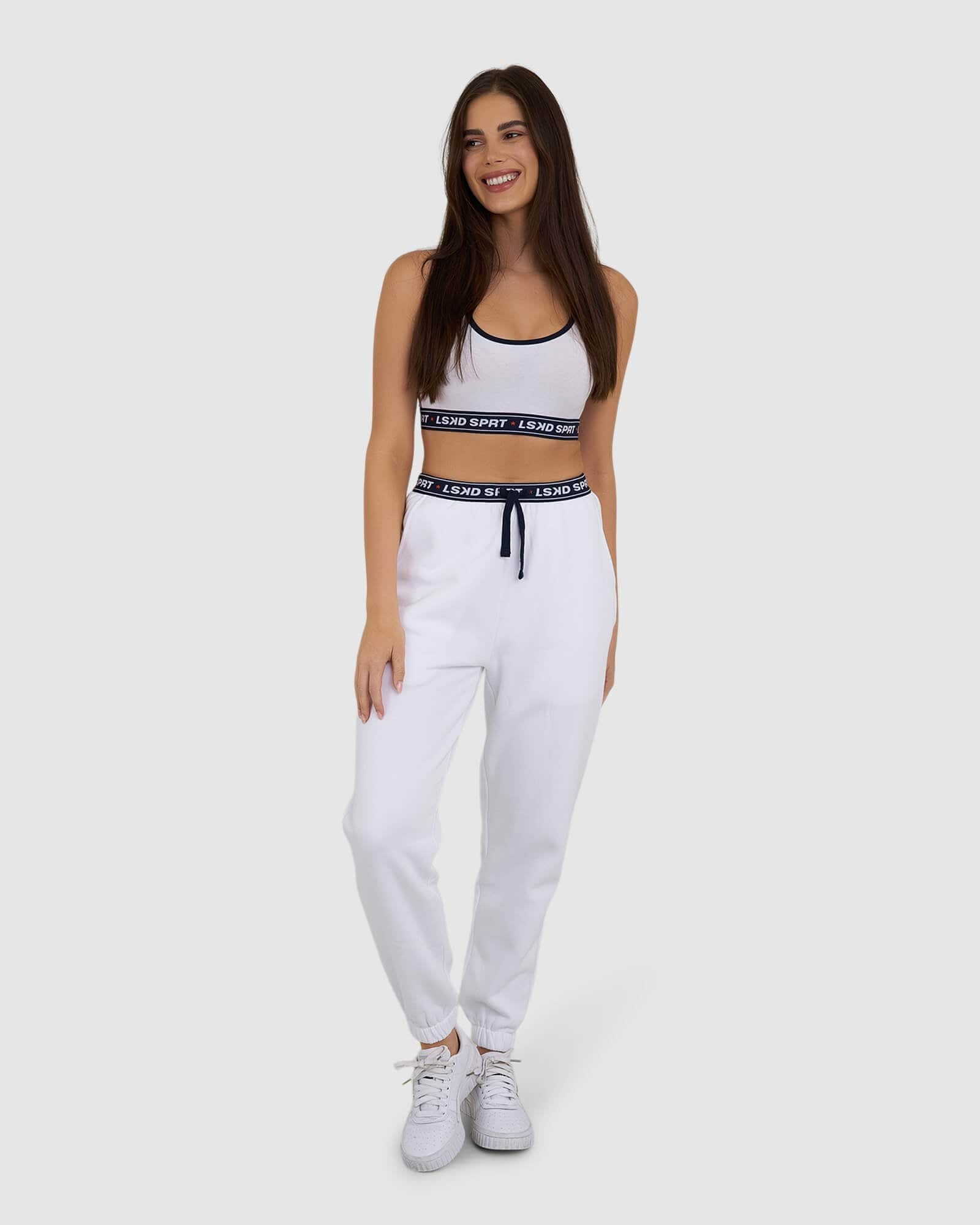 Model wearing Challenge Lounge Track Pant - White