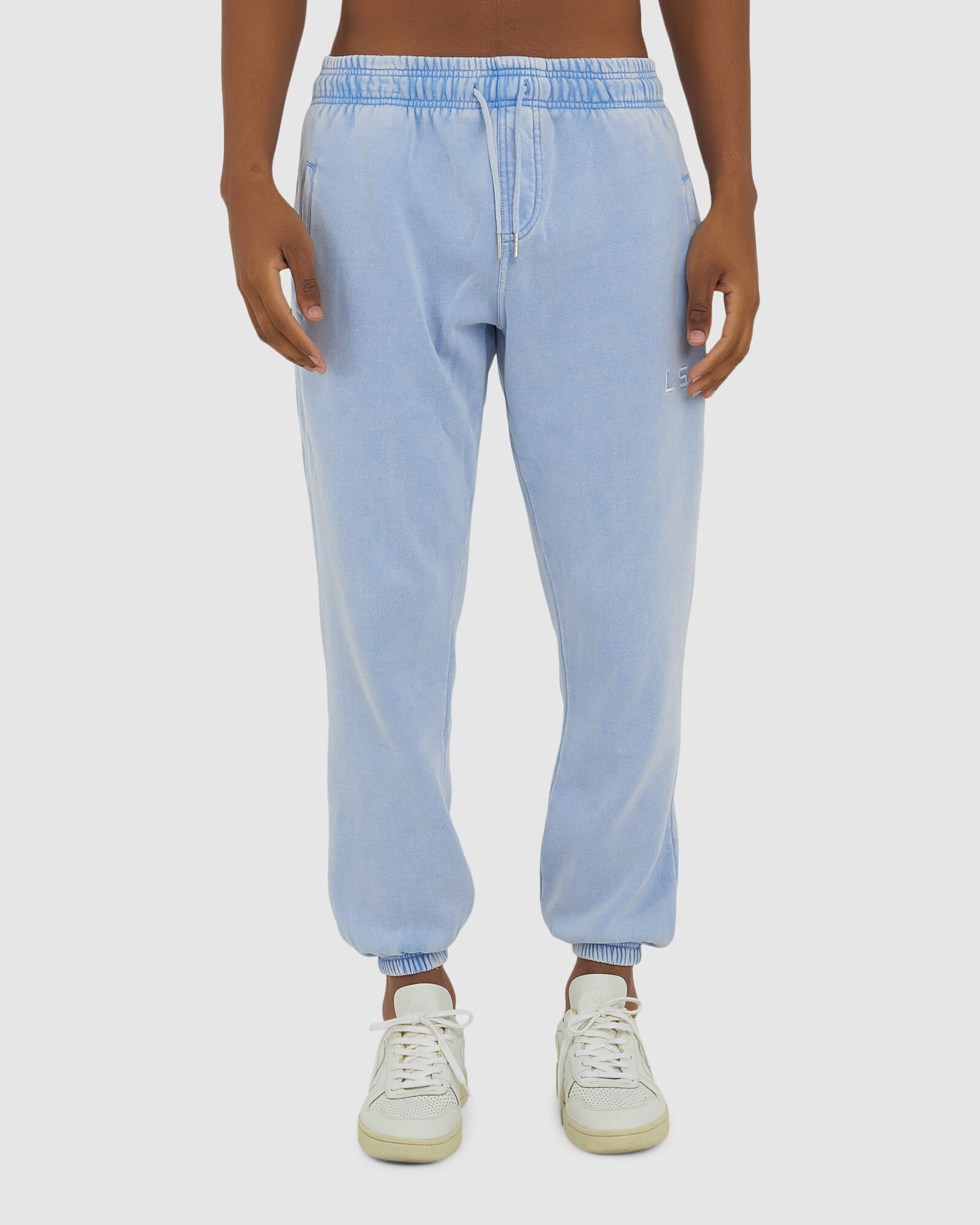 Model wearing Essential Track Pant - Pilled Pigment Blue