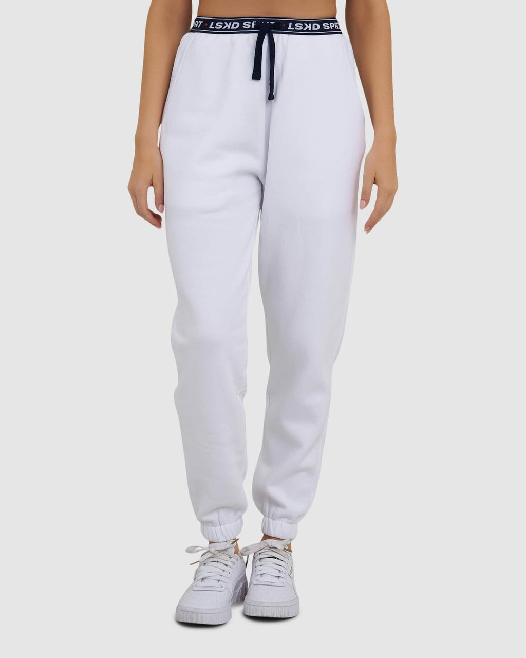 Model wearing Challenge Lounge Track Pant - White