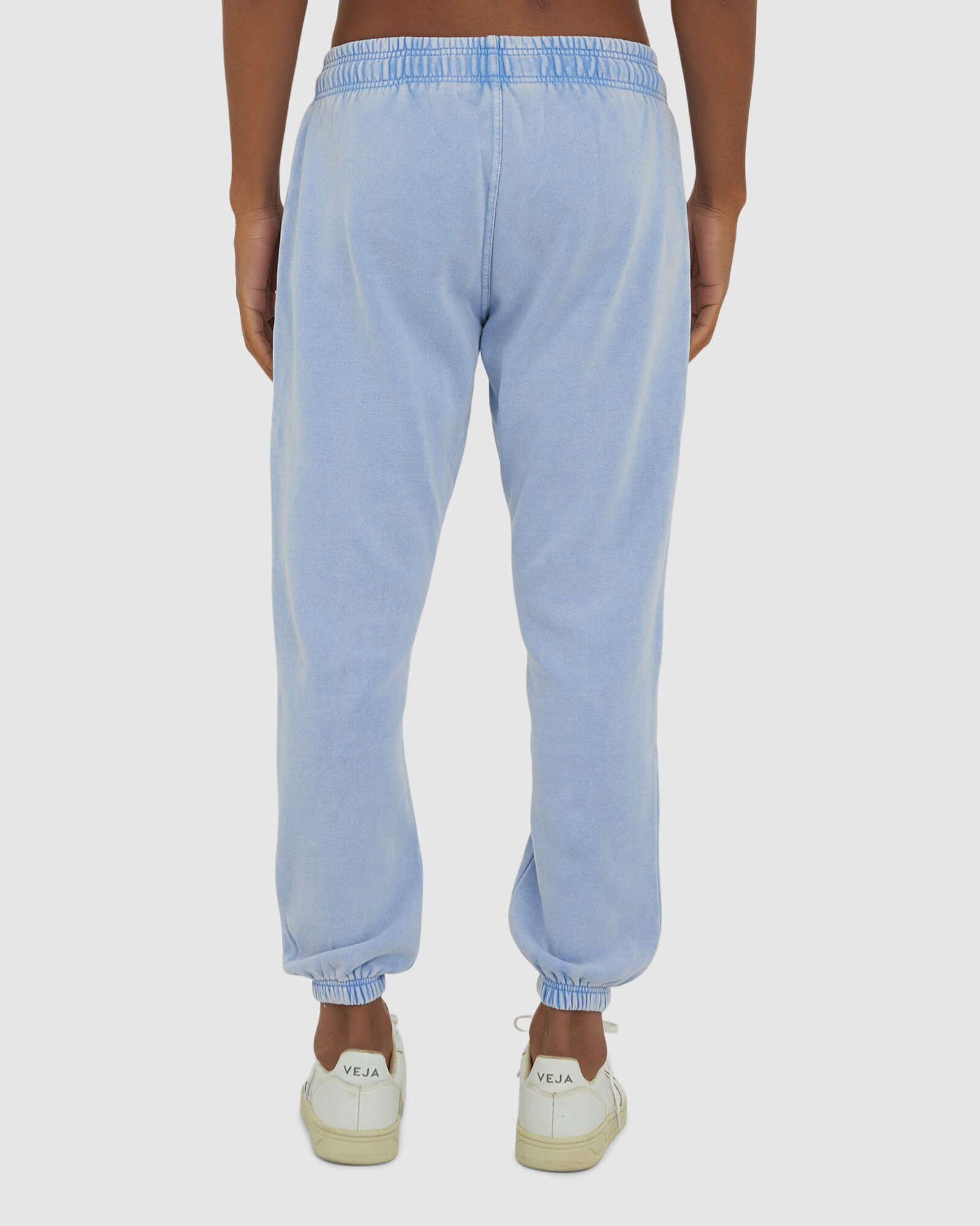 Model wearing Essential Track Pant - Pilled Pigment Blue