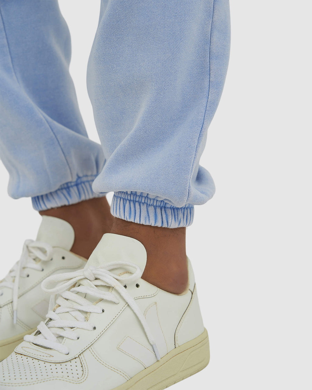 Model wearing Essential Track Pant - Pilled Pigment Blue