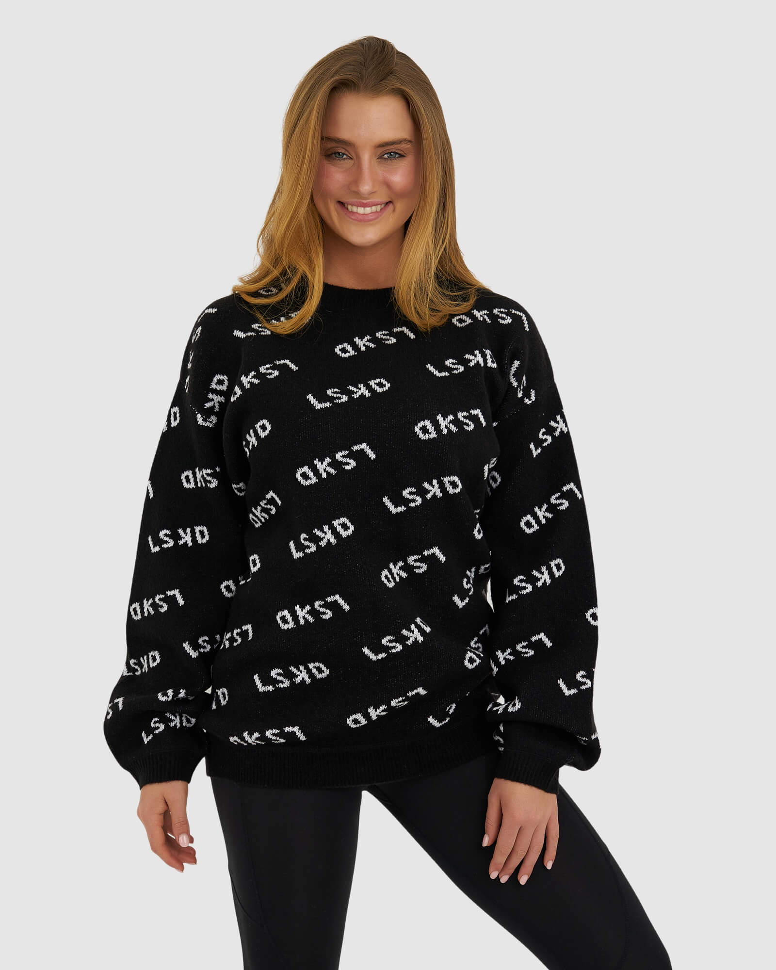 Model wearing Duplicate Knit Sweater - Black