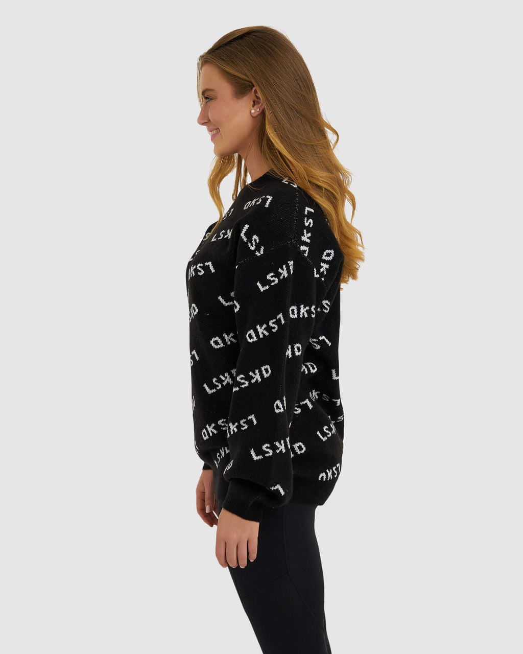 Model wearing Duplicate Knit Sweater - Black