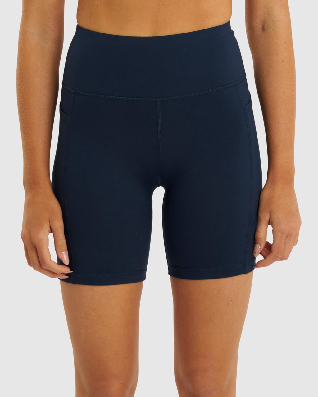 Model wearing Rep Mid Short Tight Small Logo - Carbon