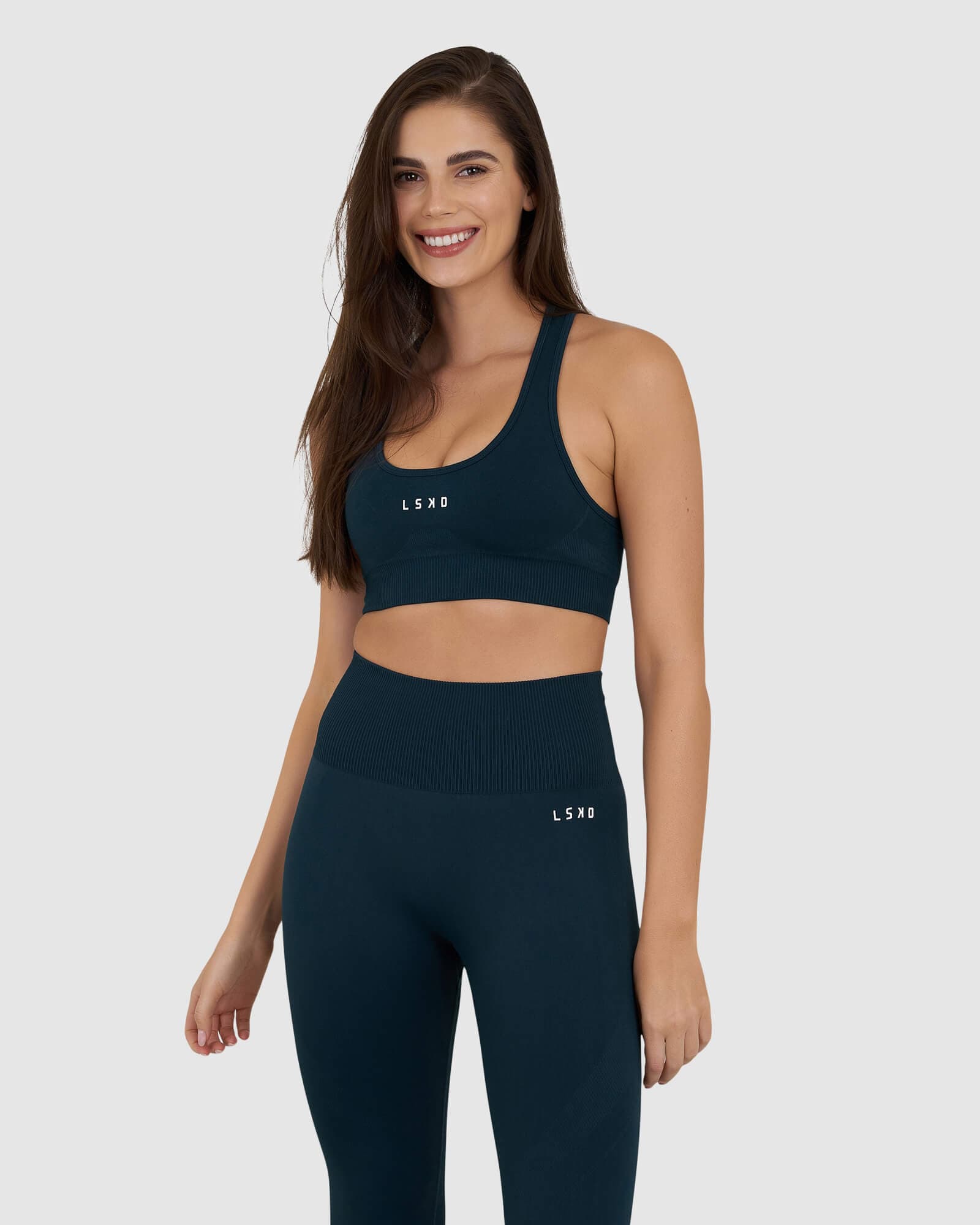 Model wearing Limitless Seamless Sports Bra - Deep Teal
