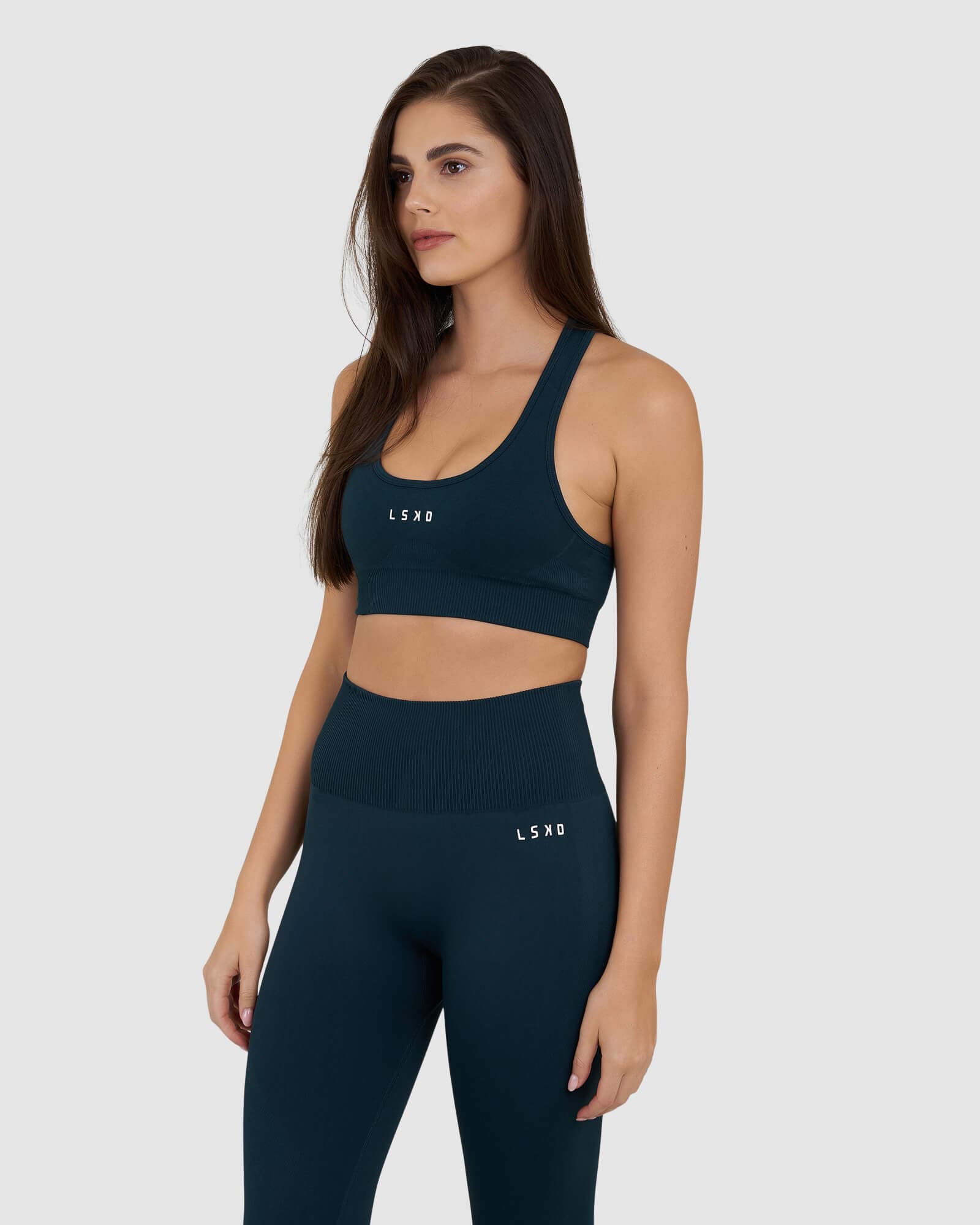 Model wearing Limitless Seamless Sports Bra - Deep Teal
