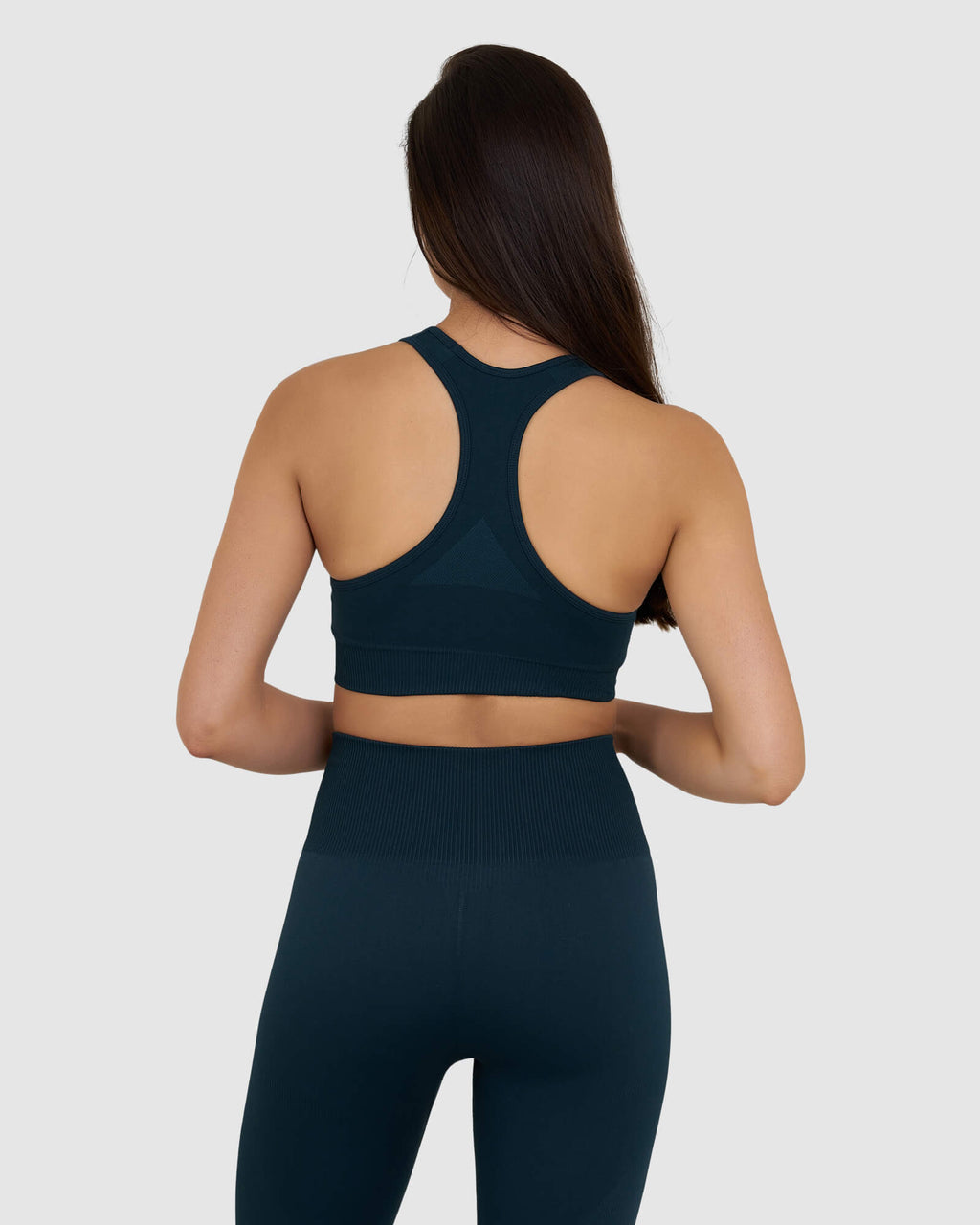 Model wearing Limitless Seamless Sports Bra - Deep Teal
