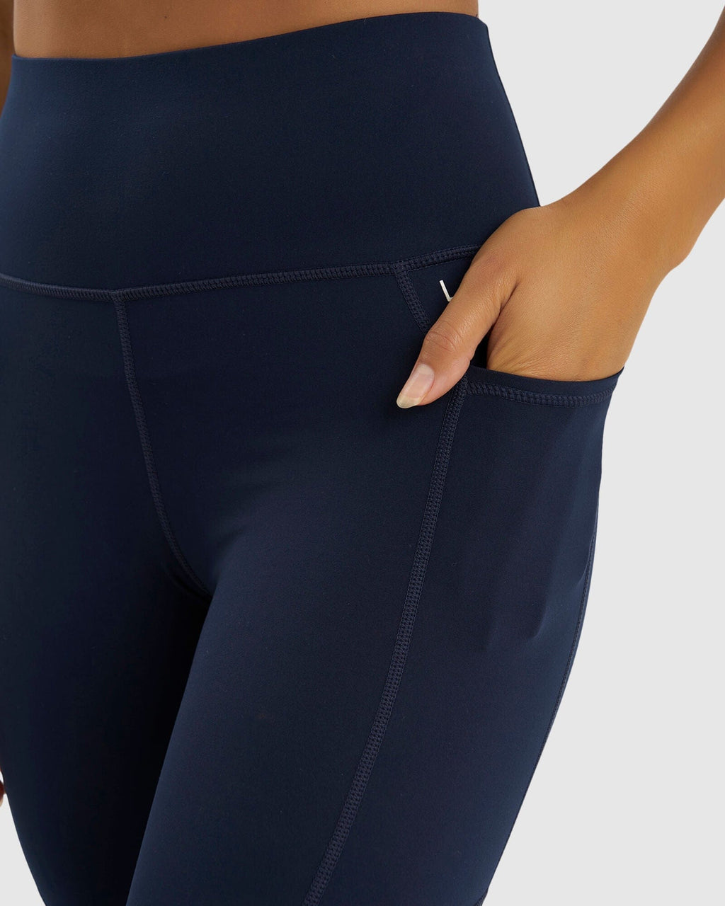 Model wearing Rep 3/4 Length Tight Small Logo - Navy