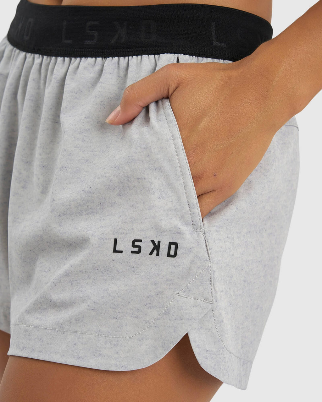 Model wearing Competition Performance Short - Light Grey Marl