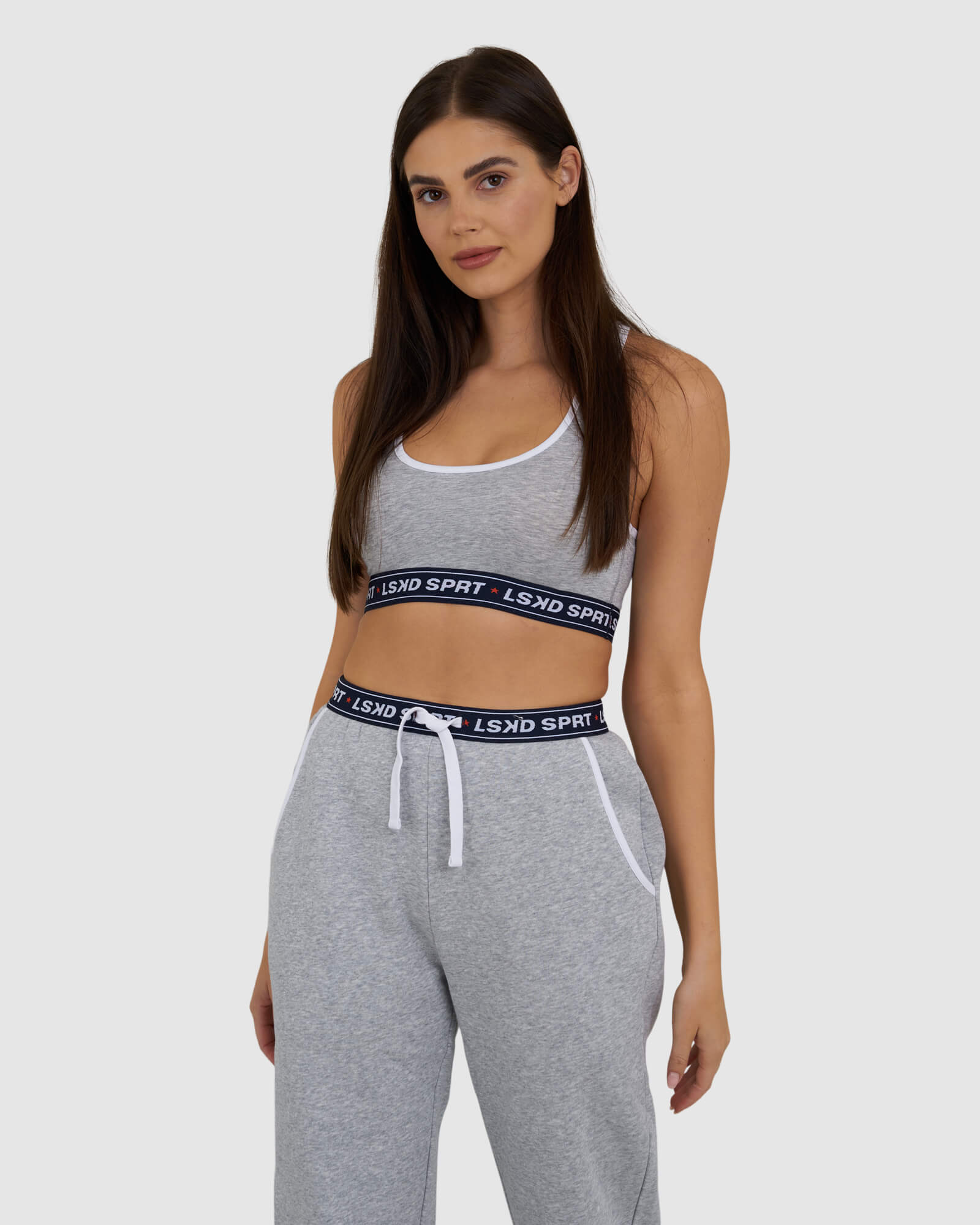 Model wearing Challenge Lounge Bra - Lt Grey Marl