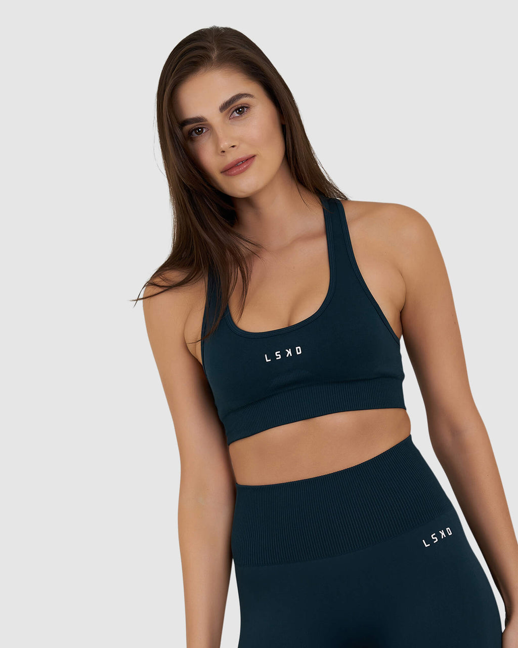Model wearing Limitless Seamless Sports Bra - Deep Teal
