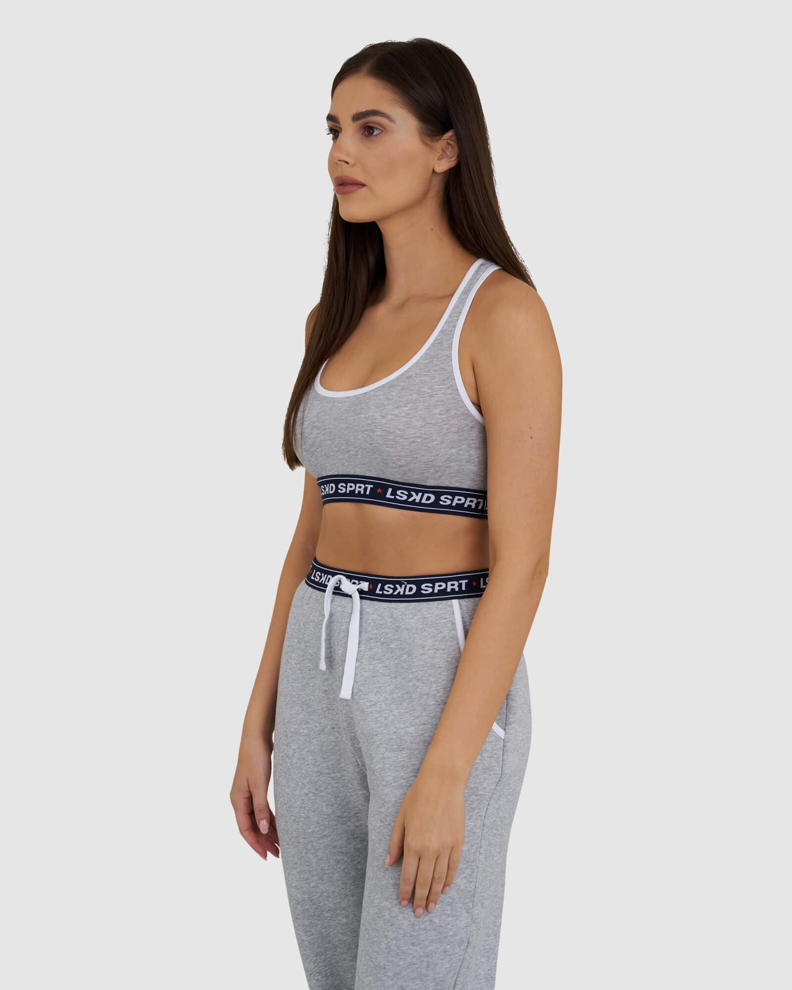 Model wearing Challenge Lounge Bra - Lt Grey Marl