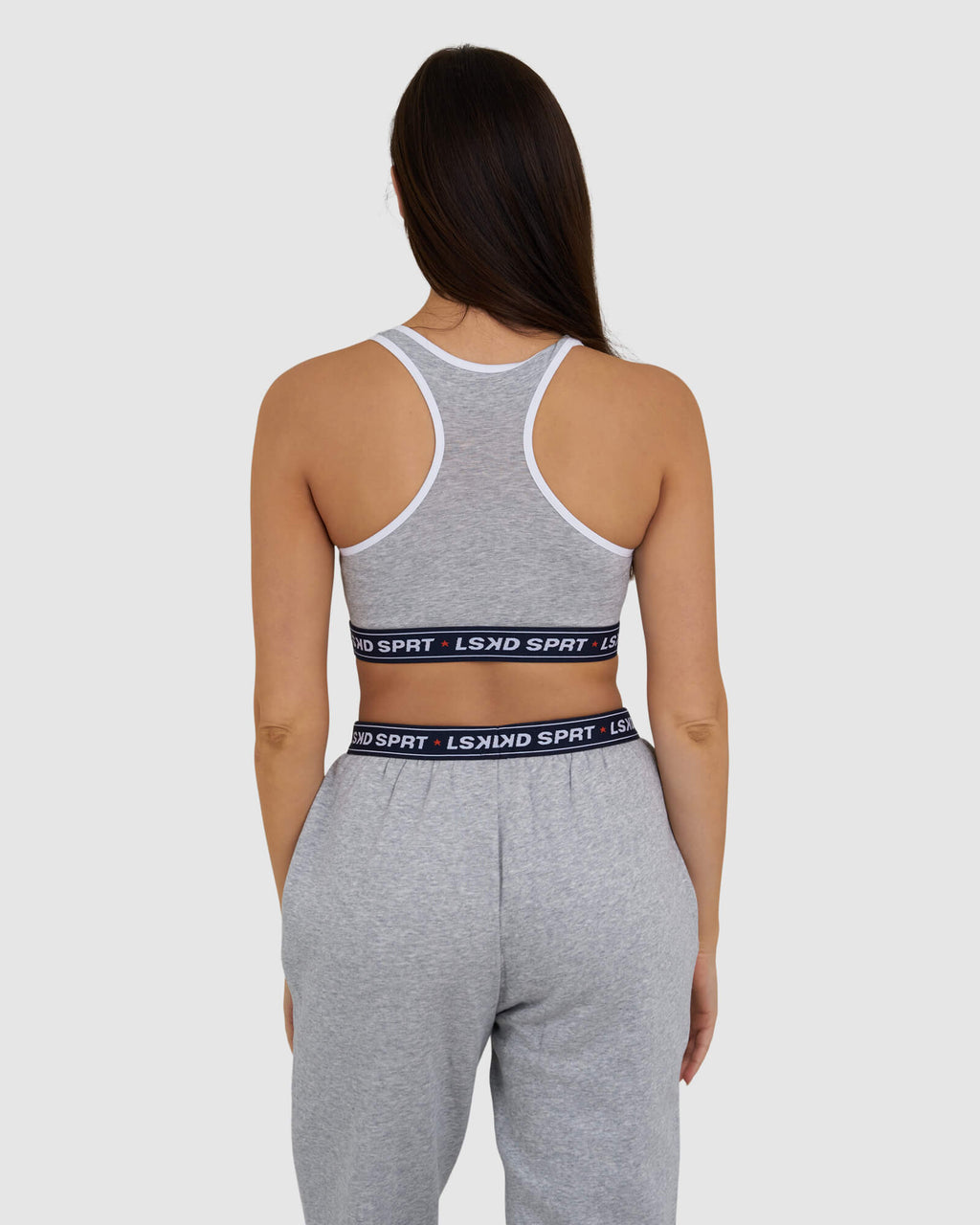 Model wearing Challenge Lounge Bra - Lt Grey Marl