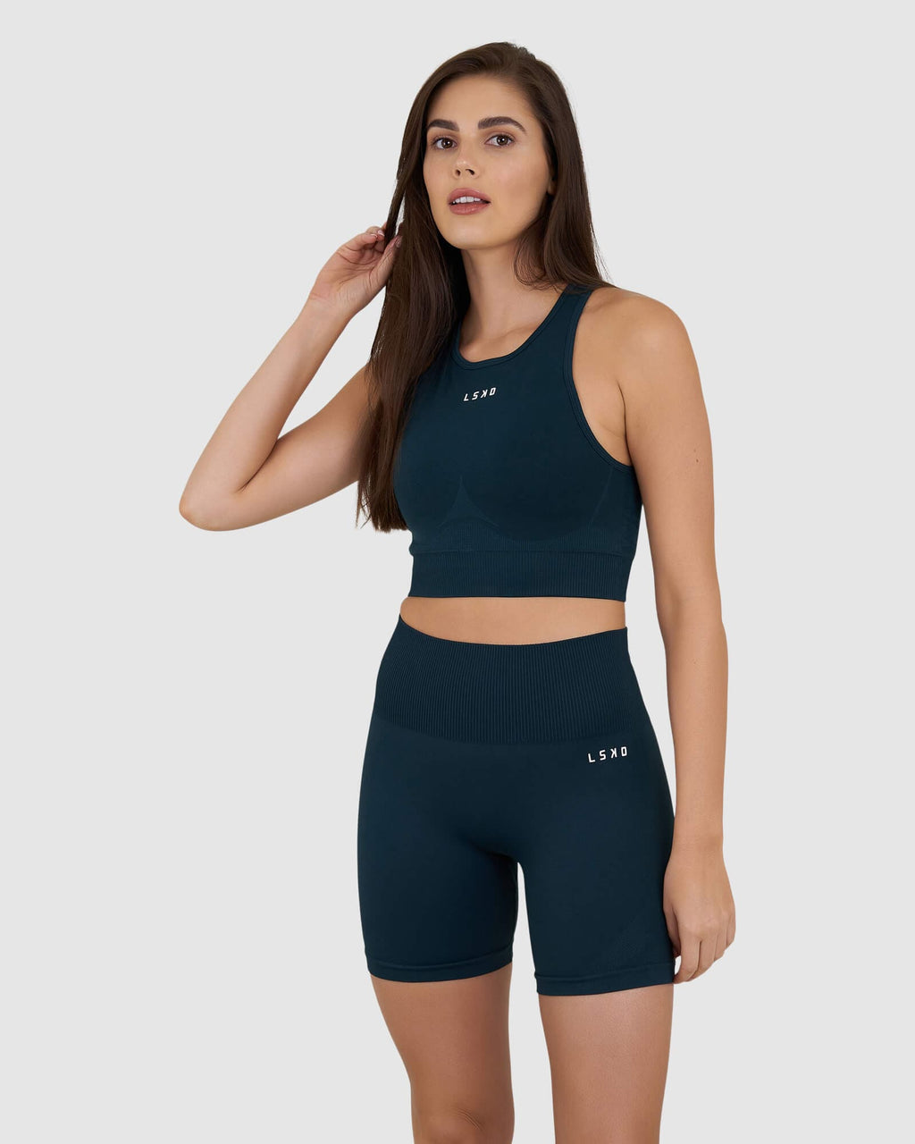 Model wearing Limitless Seamless Crop Top - Deep Teal