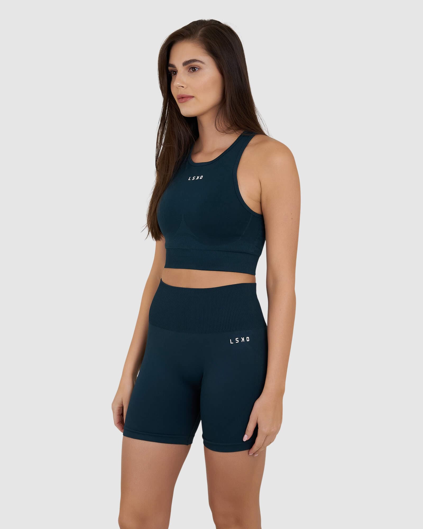 Model wearing Limitless Seamless Crop Top - Deep Teal