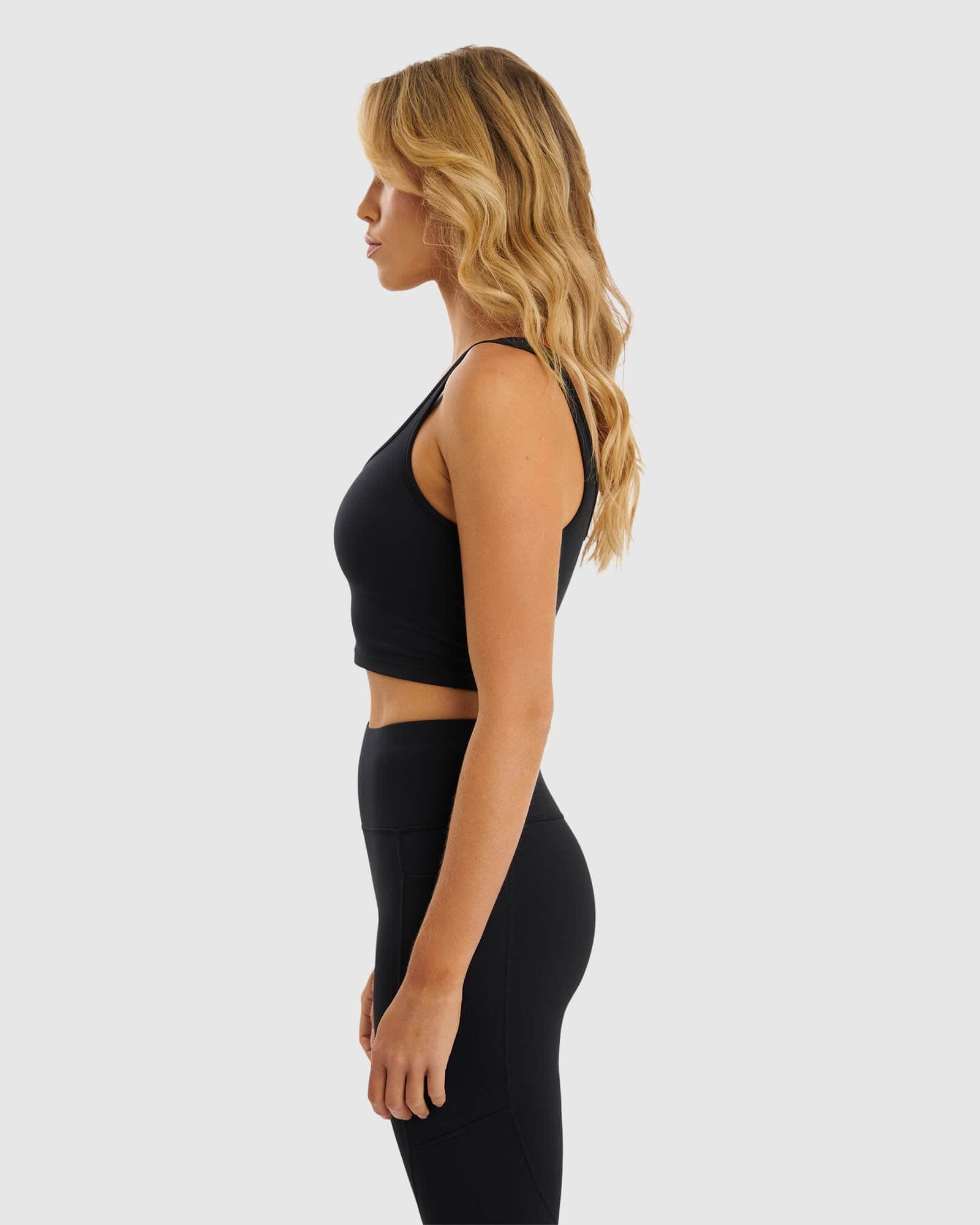 Model wearing Knockout Active Tank - Black