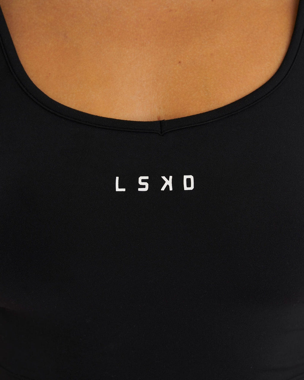 Model wearing Knockout Active Tank - Black