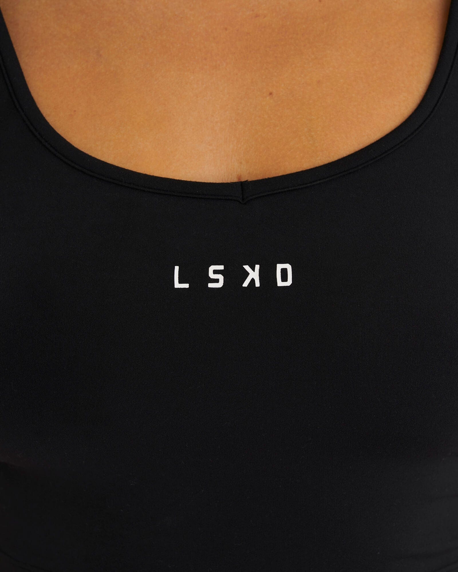 Model wearing Knockout Active Tank - Black