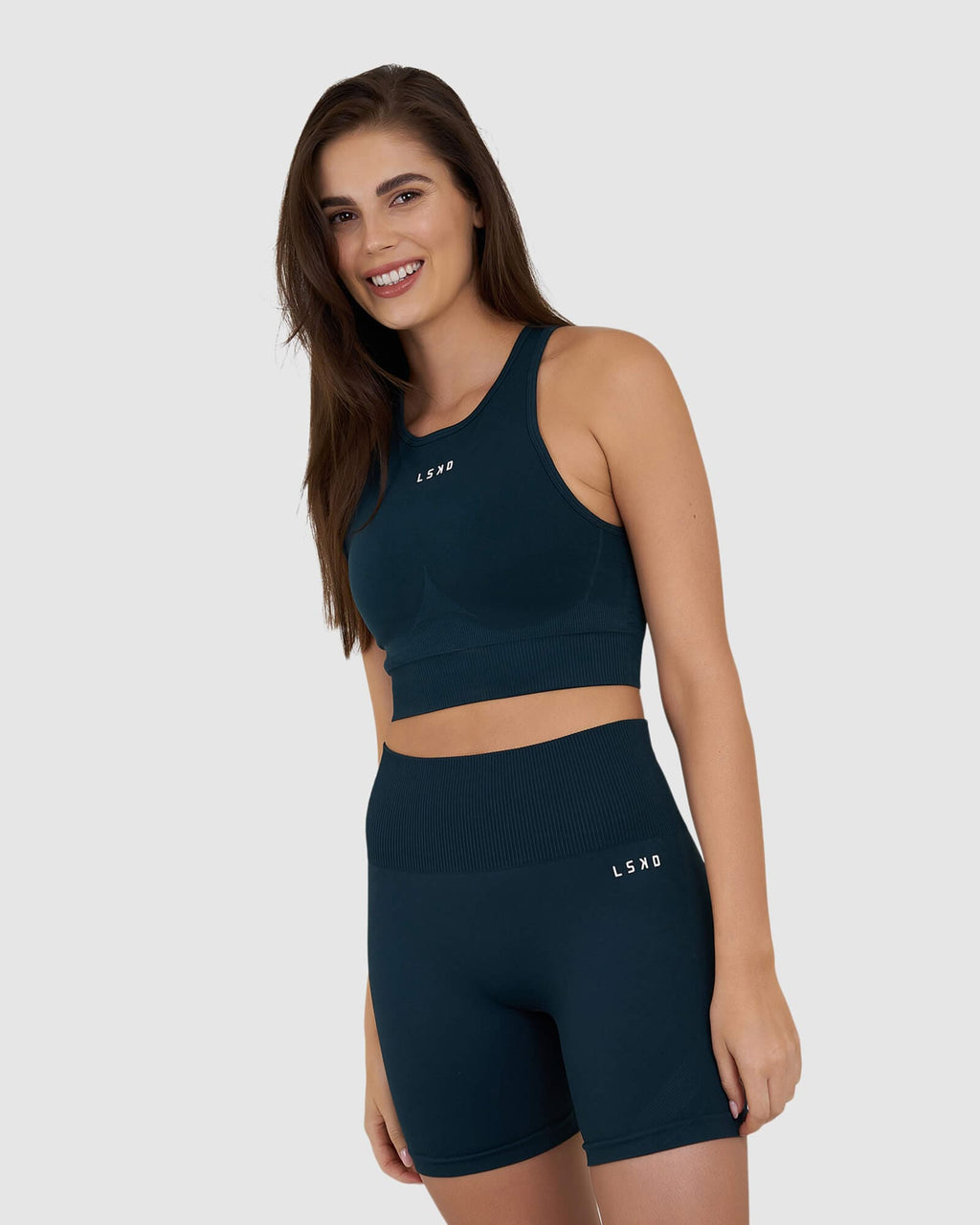 Model wearing Limitless Seamless Crop Top - Deep Teal