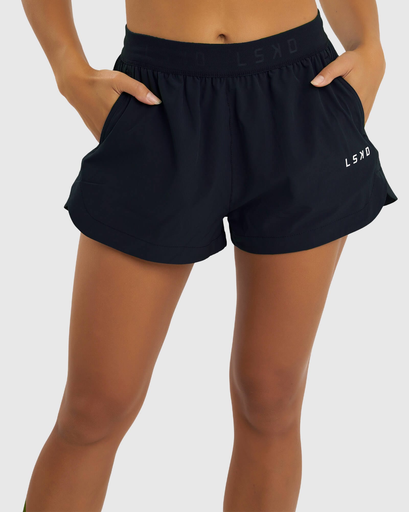 Model wearing Competition Performance Short - Carbon